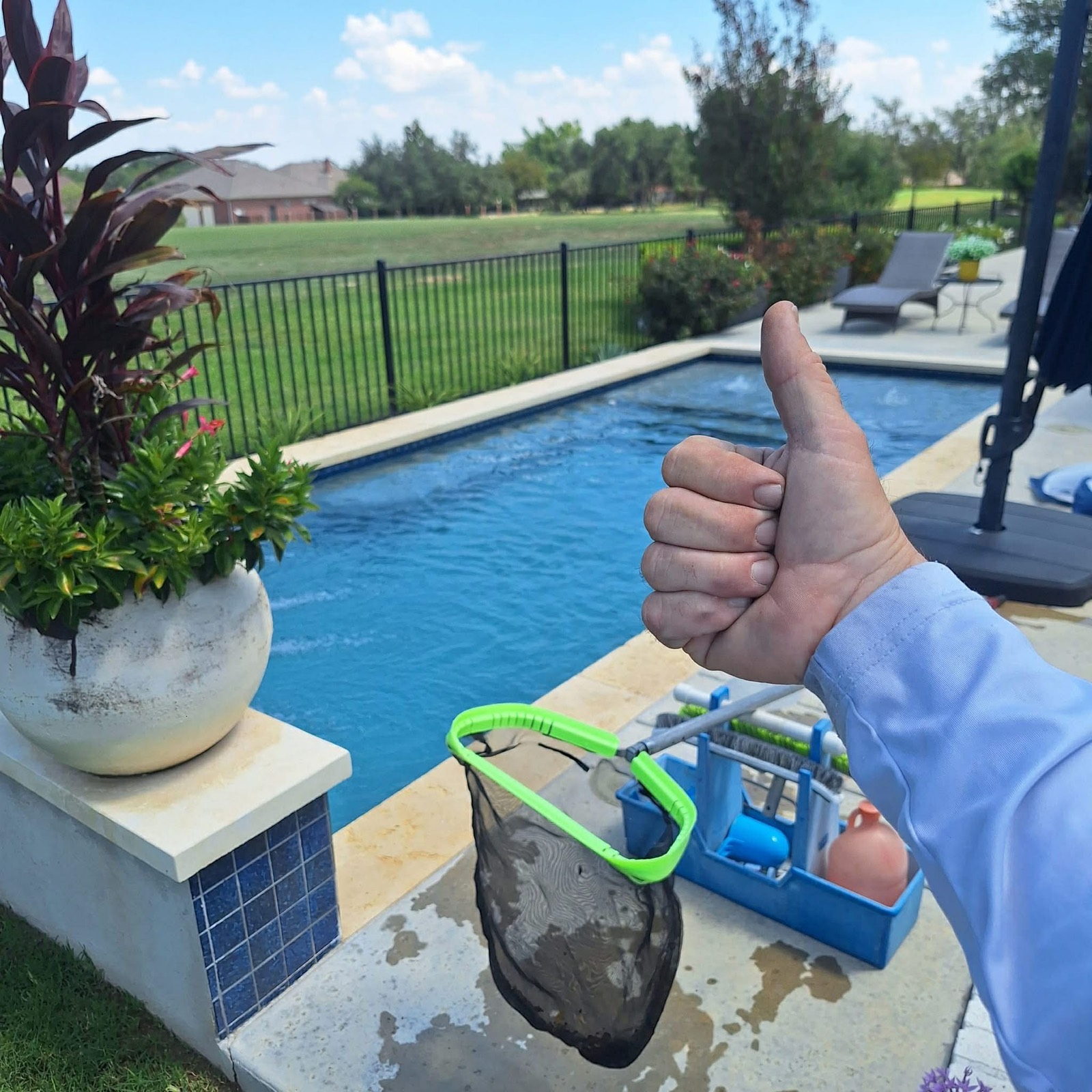 Sparkling clean Austin backyard pool — professional maintenance by The Pool Police
